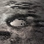 How Do Potholes Form In Asphalt Roadways?